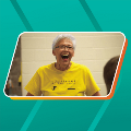 An elderly woman laughing